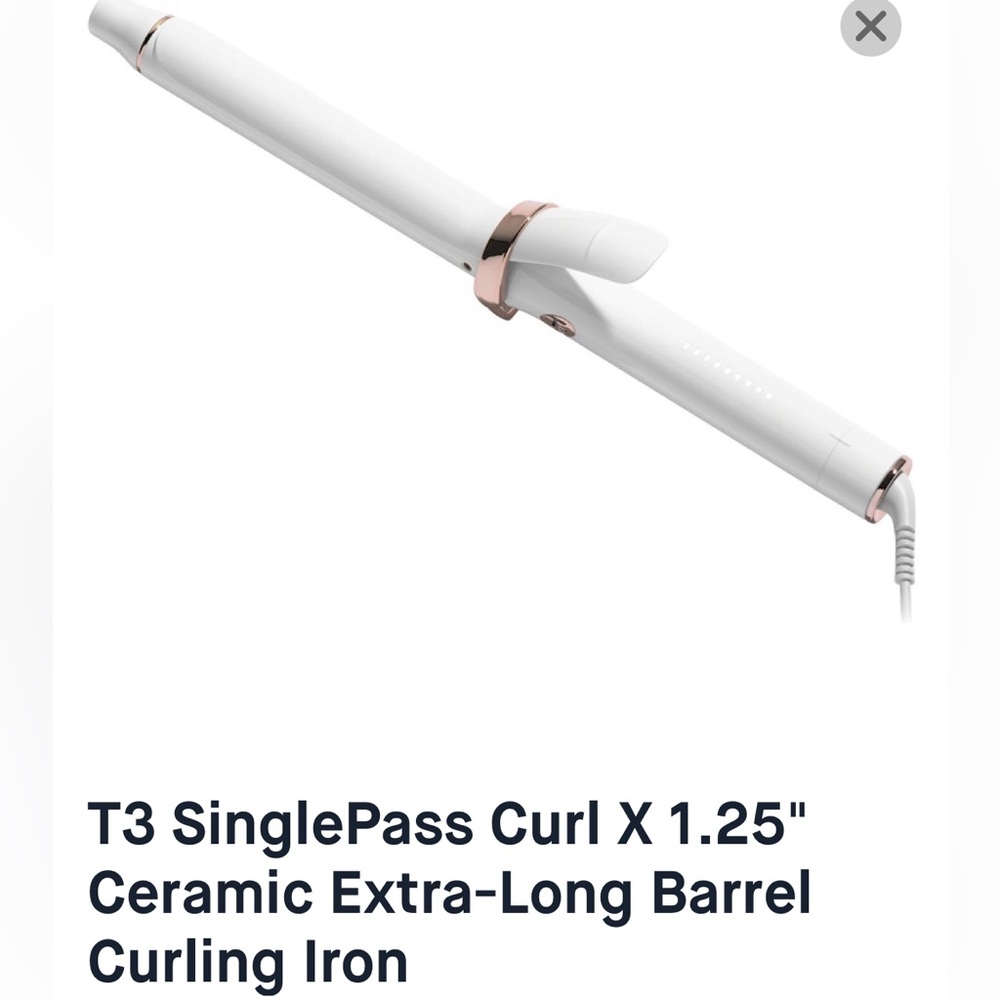 New in box t3 curling iron!